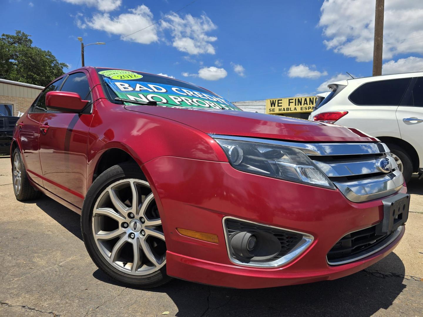 2012 RED Ford Fusion SE (3FAHP0HA8CR) with an 2.5L L4 DOHC 16V engine, AUTO transmission, located at 2660 S.Garland Avenue, Garland, TX, 75041, (469) 298-3118, 32.885387, -96.656776 - Photo#0