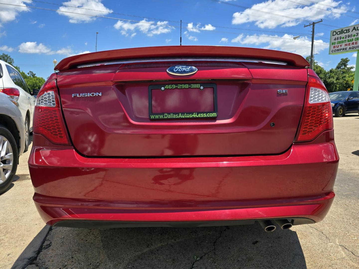 2012 RED Ford Fusion SE (3FAHP0HA8CR) with an 2.5L L4 DOHC 16V engine, AUTO transmission, located at 2660 S.Garland Avenue, Garland, TX, 75041, (469) 298-3118, 32.885387, -96.656776 - Photo#4