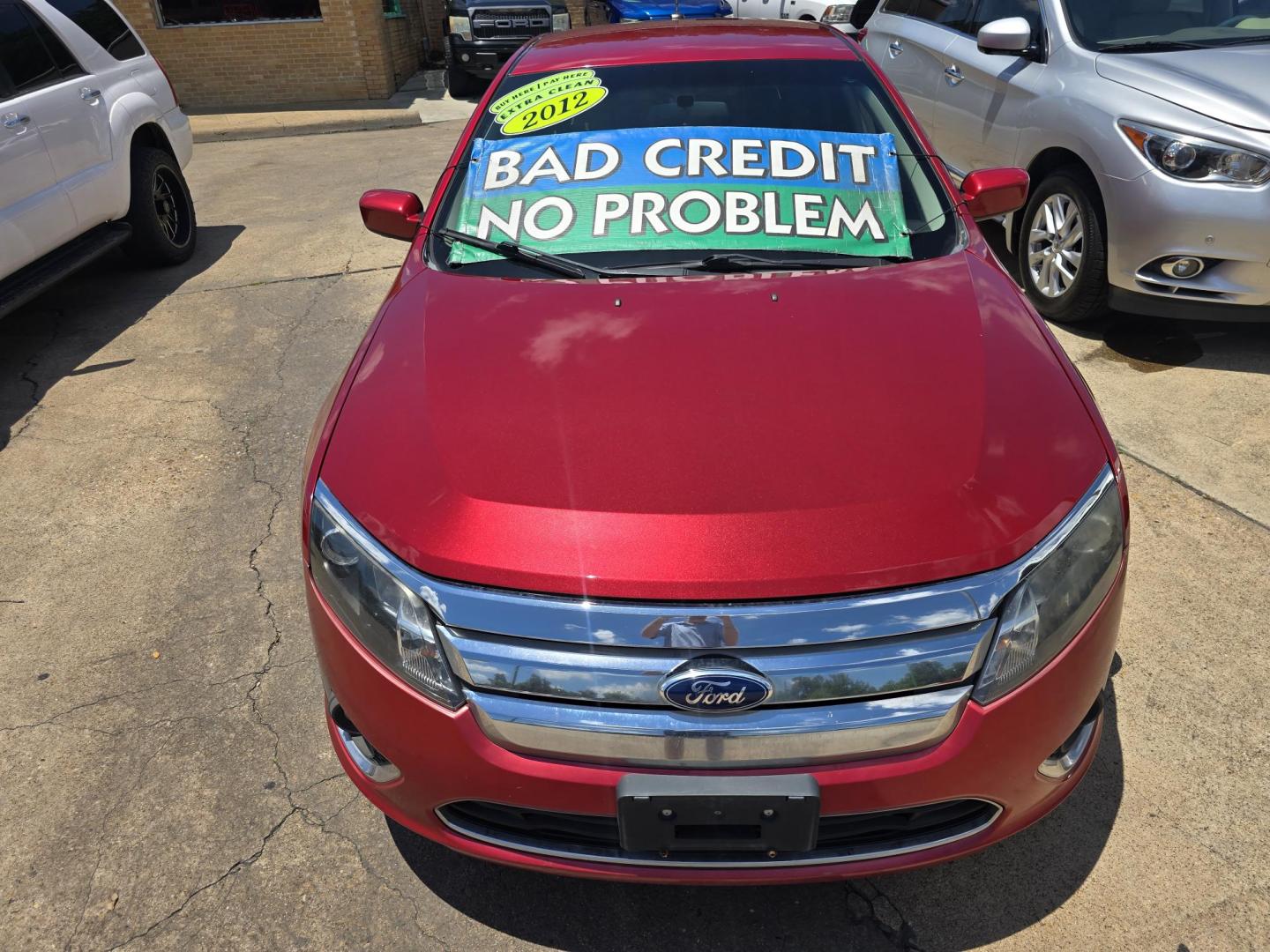 2012 RED Ford Fusion SE (3FAHP0HA8CR) with an 2.5L L4 DOHC 16V engine, AUTO transmission, located at 2660 S.Garland Avenue, Garland, TX, 75041, (469) 298-3118, 32.885387, -96.656776 - Photo#8
