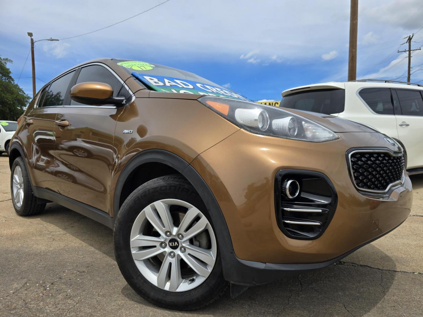 2017 BROWN Kia Sportage LX (KNDPMCAC3H7) with an 2.4L V6 DOHC 24V engine, 6A transmission, located at 2660 S.Garland Avenue, Garland, TX, 75041, (469) 298-3118, 32.885387, -96.656776 - Photo#0