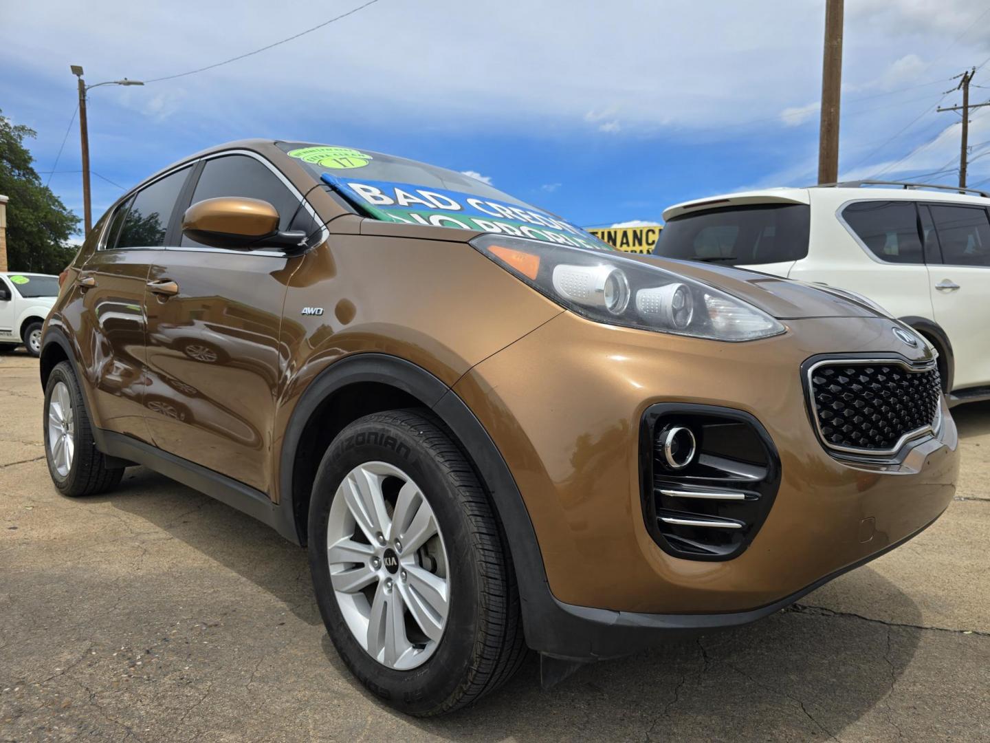 2017 BROWN Kia Sportage LX (KNDPMCAC3H7) with an 2.4L V6 DOHC 24V engine, 6A transmission, located at 2660 S.Garland Avenue, Garland, TX, 75041, (469) 298-3118, 32.885387, -96.656776 - Photo#1